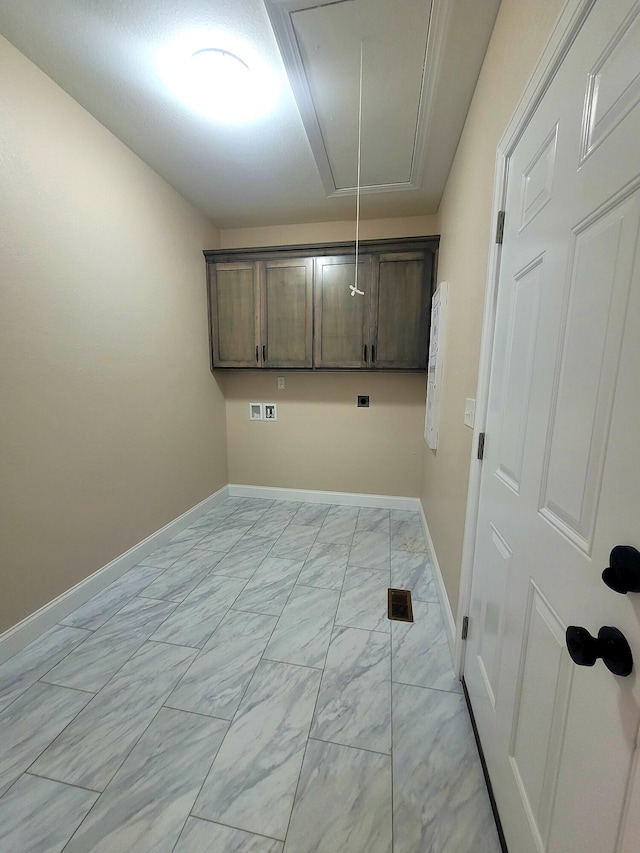 laundry room with electric dryer hookup, cabinets, and washer hookup