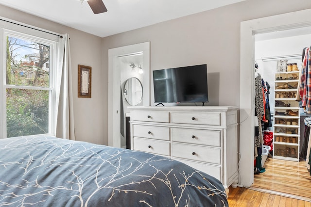 bedroom featuring ceiling fan and light hardwood / wood-style flooring