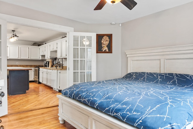 bedroom featuring ceiling fan and light wood-type flooring