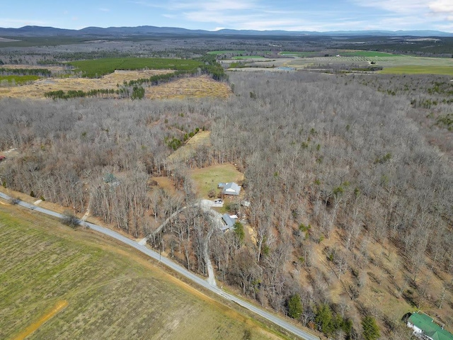 drone / aerial view with a mountain view and a rural view