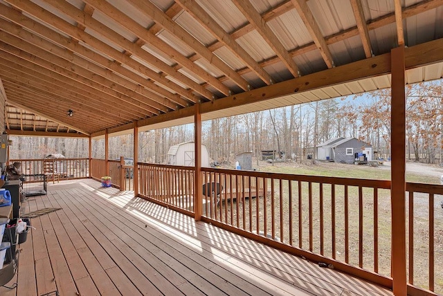 deck featuring a storage unit