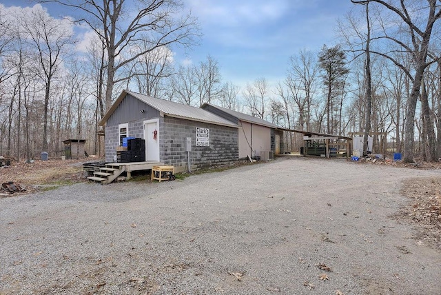 exterior space featuring a carport and cooling unit