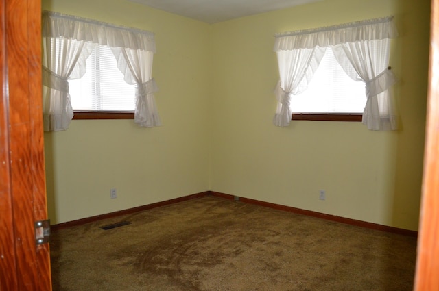 empty room with carpet floors