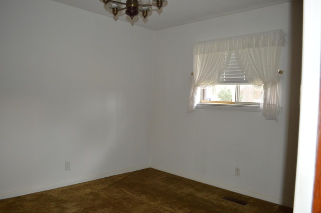 view of carpeted spare room