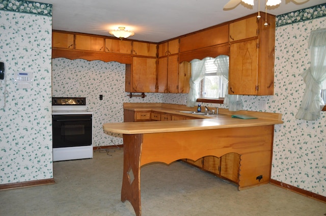 kitchen featuring kitchen peninsula, ceiling fan, sink, and white electric stove