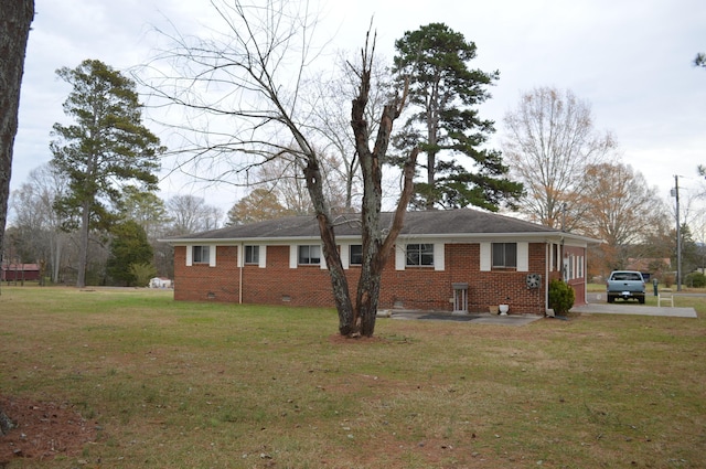 exterior space featuring a front lawn