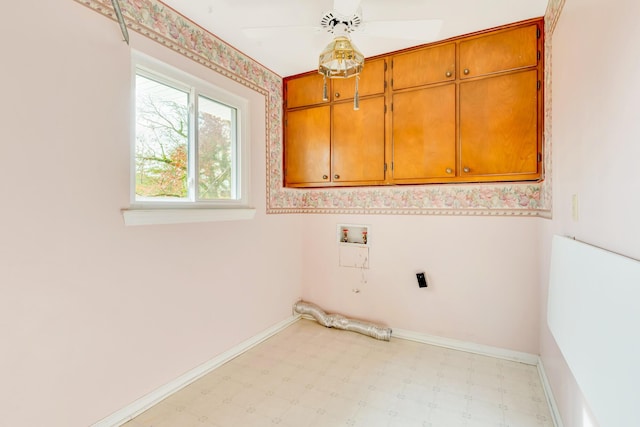 washroom featuring cabinets, washer hookup, and ceiling fan