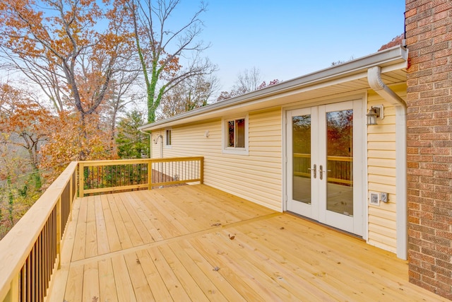 wooden terrace featuring french doors