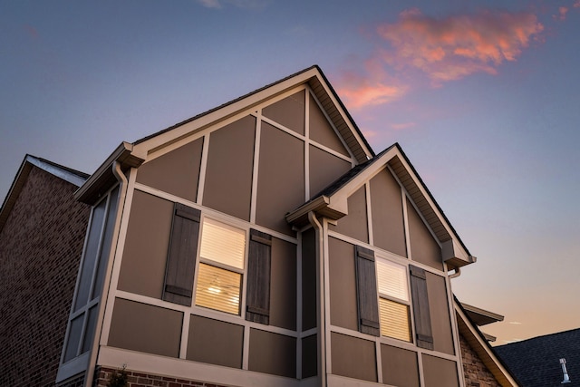 view of property exterior at dusk