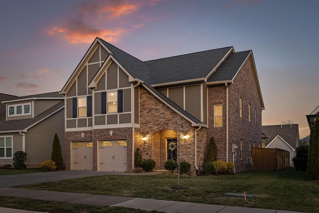 1539 Buttonwood Loop, Chattanooga, TN 37421 - tudor-style house featuring a garage and a lawn