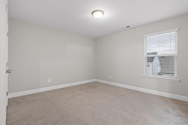 view of carpeted spare room