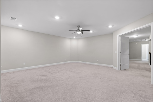 carpeted empty room with ceiling fan