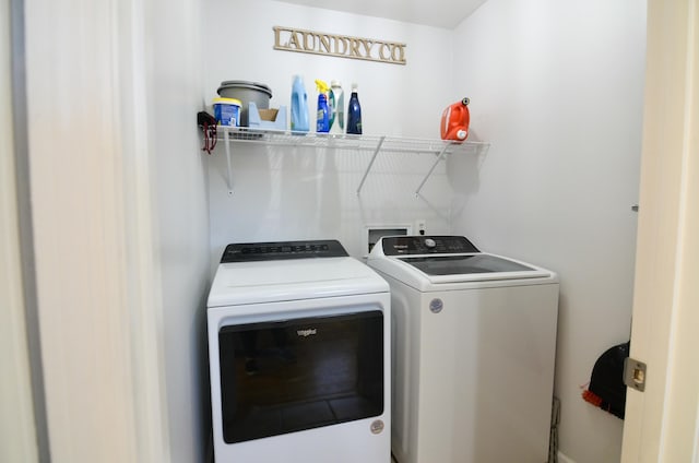 laundry room with washer and dryer