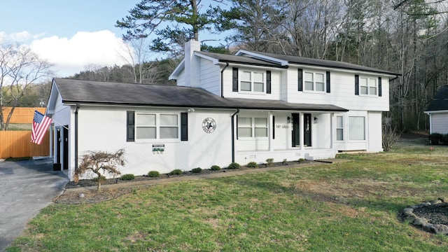 view of front of house with a front yard