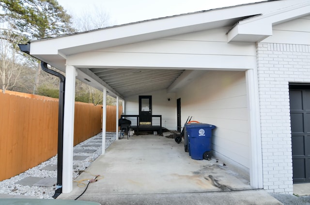 view of vehicle parking with a carport