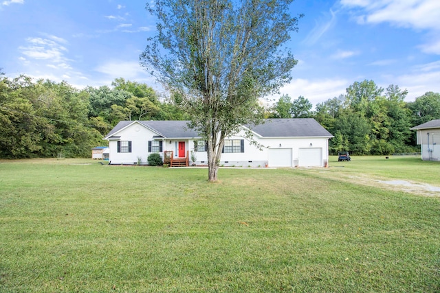 ranch-style home with a front yard and a garage