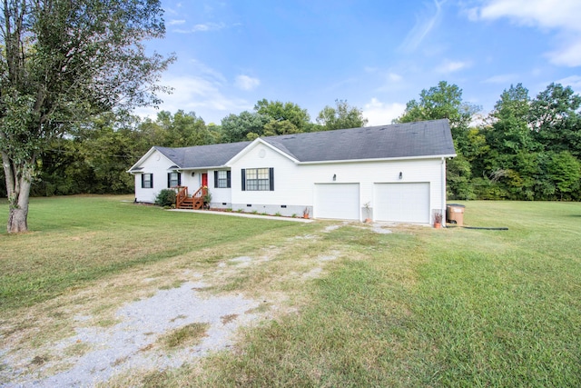 ranch-style house with a front lawn and a garage