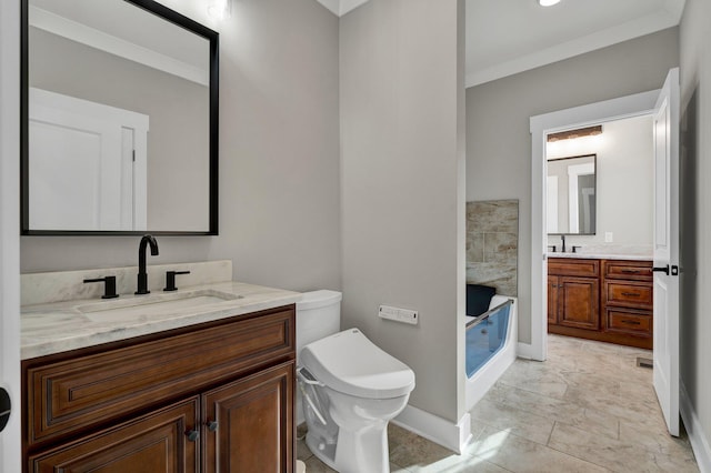 bathroom featuring vanity, toilet, walk in shower, and ornamental molding