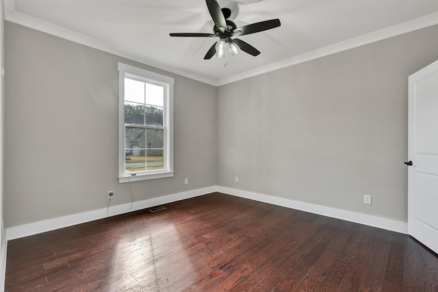 unfurnished room featuring dark hardwood / wood-style floors, ceiling fan, and crown molding