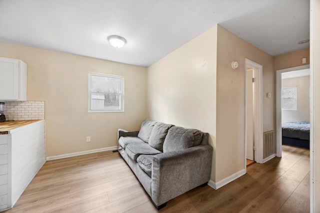 living area featuring light hardwood / wood-style flooring