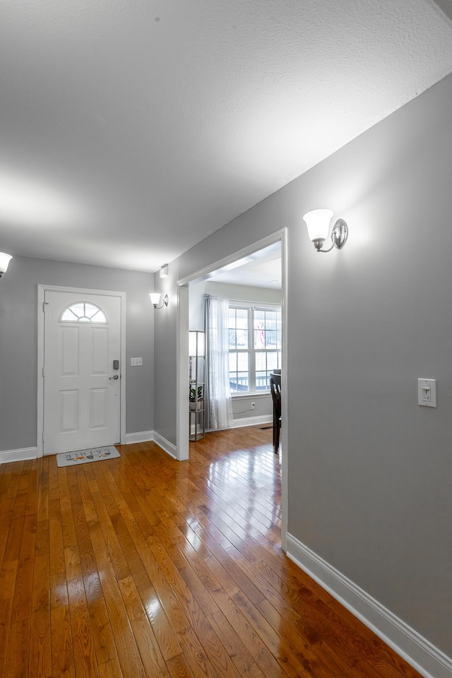 foyer featuring hardwood / wood-style floors