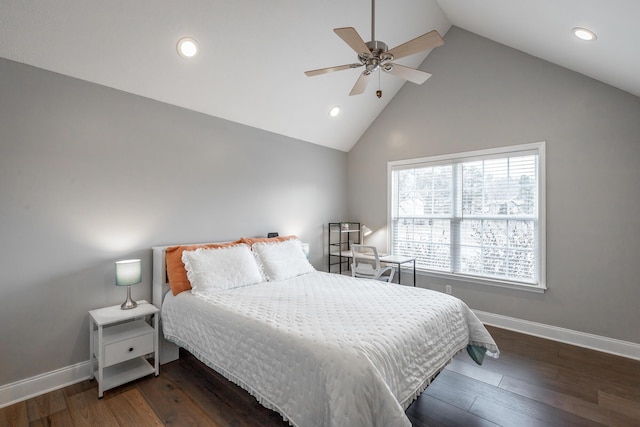 bedroom with lofted ceiling, dark hardwood / wood-style floors, and ceiling fan