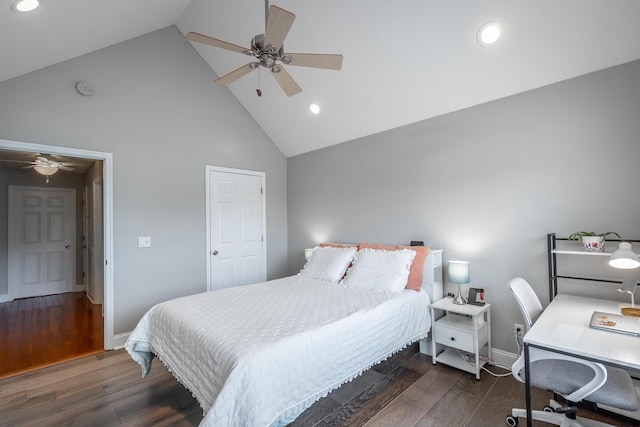 bedroom with dark wood-type flooring, high vaulted ceiling, and ceiling fan