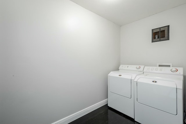 laundry room featuring independent washer and dryer