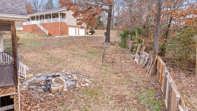 view of yard with a garage