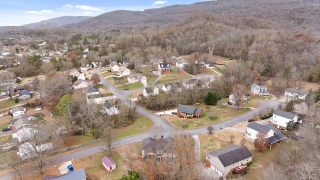 birds eye view of property featuring a mountain view