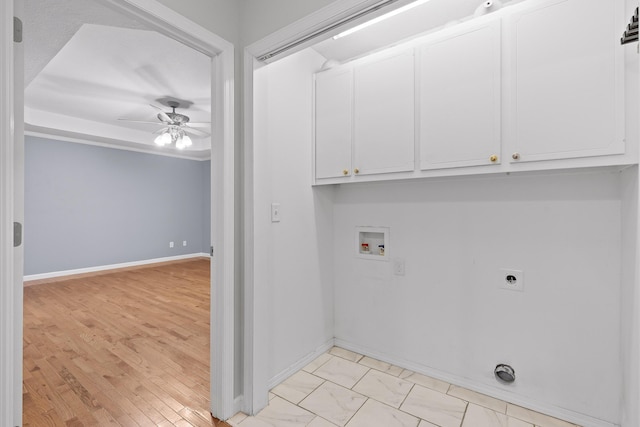 clothes washing area featuring cabinets, hookup for a washing machine, ceiling fan, and electric dryer hookup