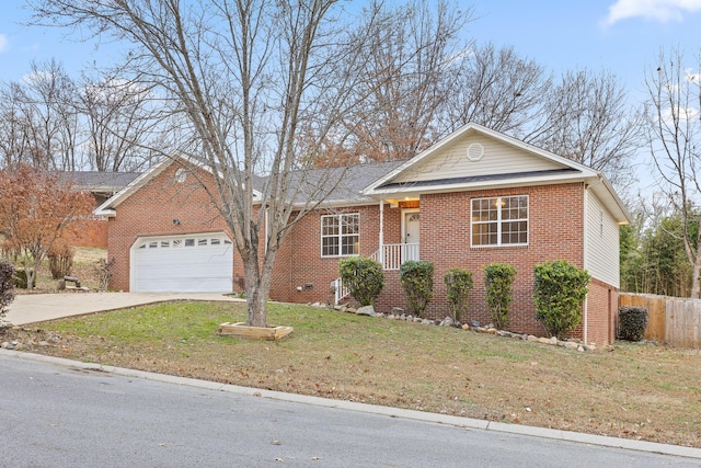 single story home featuring a garage and a front lawn