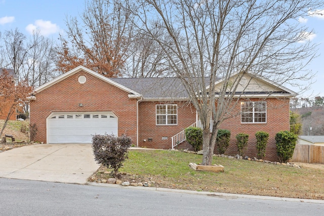 single story home with a front yard and a garage