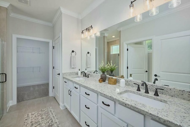 bathroom featuring vanity and ornamental molding