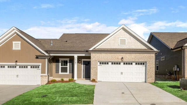 1707 Whisper Winds Ln Unit 33, Ooltewah, TN 37363 - view of front of home with brick siding, driveway, and an attached garage