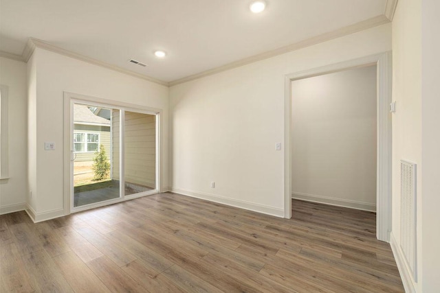 1707 Whisper Winds Ln Unit 33, Ooltewah, TN 37363 - unfurnished room with crown molding, wood finished floors, and recessed lighting
