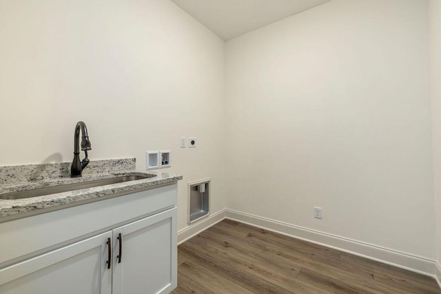 1707 Whisper Winds Ln Unit 33, Ooltewah, TN 37363 - laundry area with hookup for an electric dryer, washer hookup, dark wood finished floors, and cabinet space