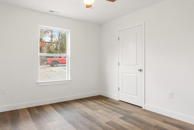 unfurnished room featuring ceiling fan and wood-type flooring