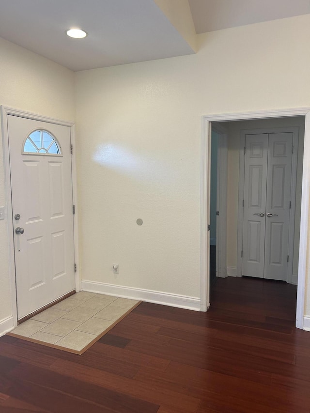 foyer with wood-type flooring