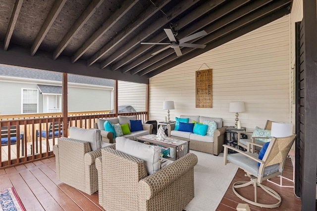 wooden terrace with ceiling fan and outdoor lounge area