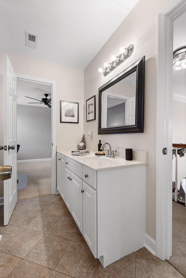 bathroom featuring vanity, tile patterned floors, and ceiling fan