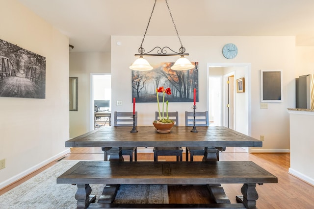 dining room featuring light hardwood / wood-style flooring