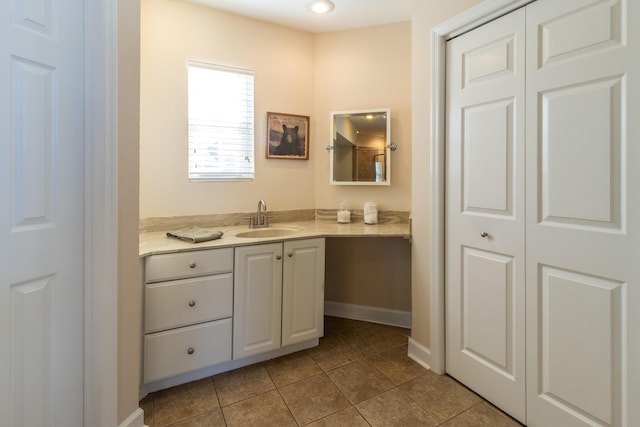 bathroom with vanity and tile patterned floors