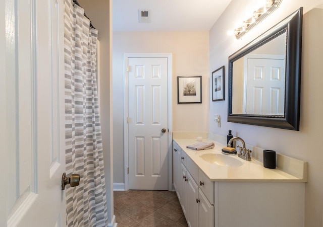 bathroom featuring vanity and tile patterned floors