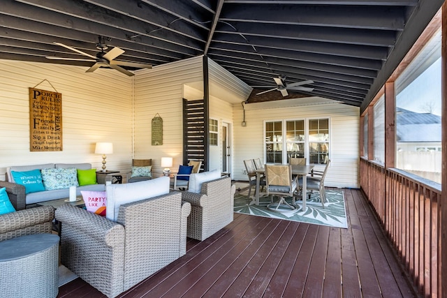 wooden terrace featuring ceiling fan and an outdoor hangout area