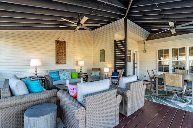 deck featuring ceiling fan and outdoor lounge area