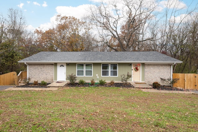 ranch-style house with a front yard