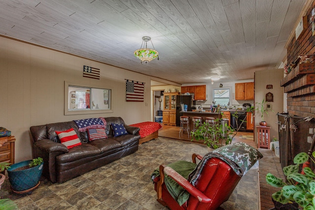 living room featuring wood ceiling