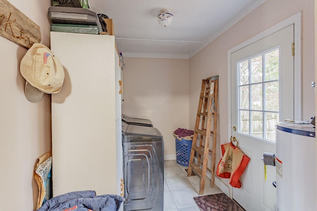 laundry area with separate washer and dryer, crown molding, light tile patterned floors, and water heater