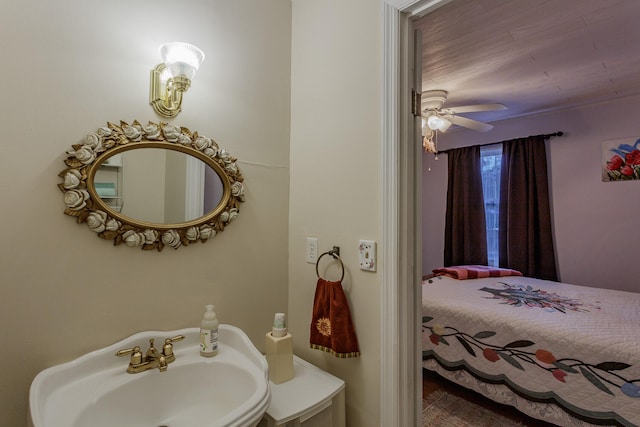 bathroom featuring ceiling fan and sink